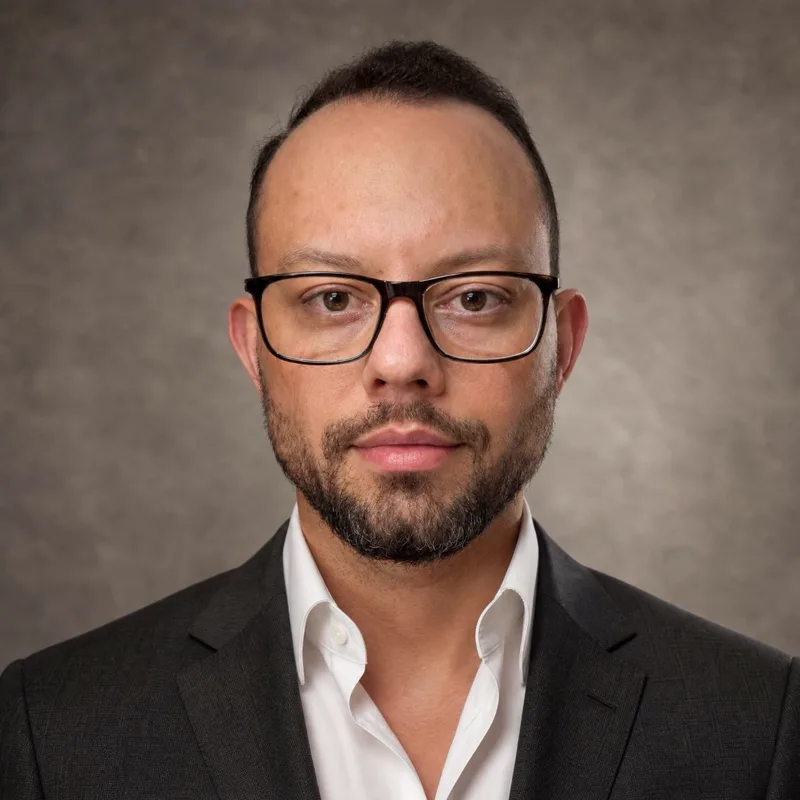 Portrait of Andrew Ratzkob, mechanical engineer specializing in AI data center infrastructure