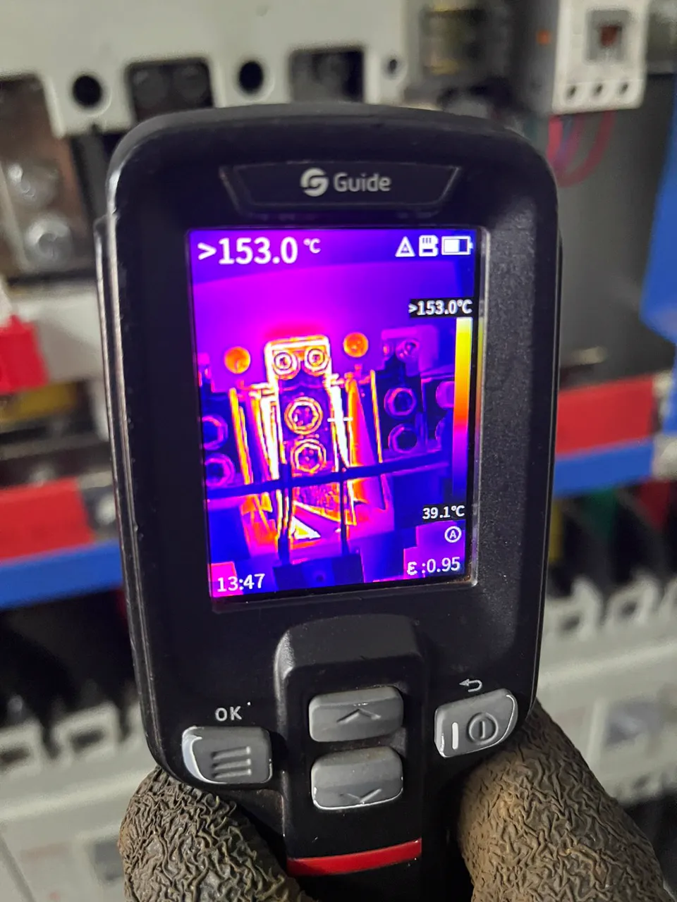 Thermal imaging camera screen showing a hotspot on an electrical panel breaker